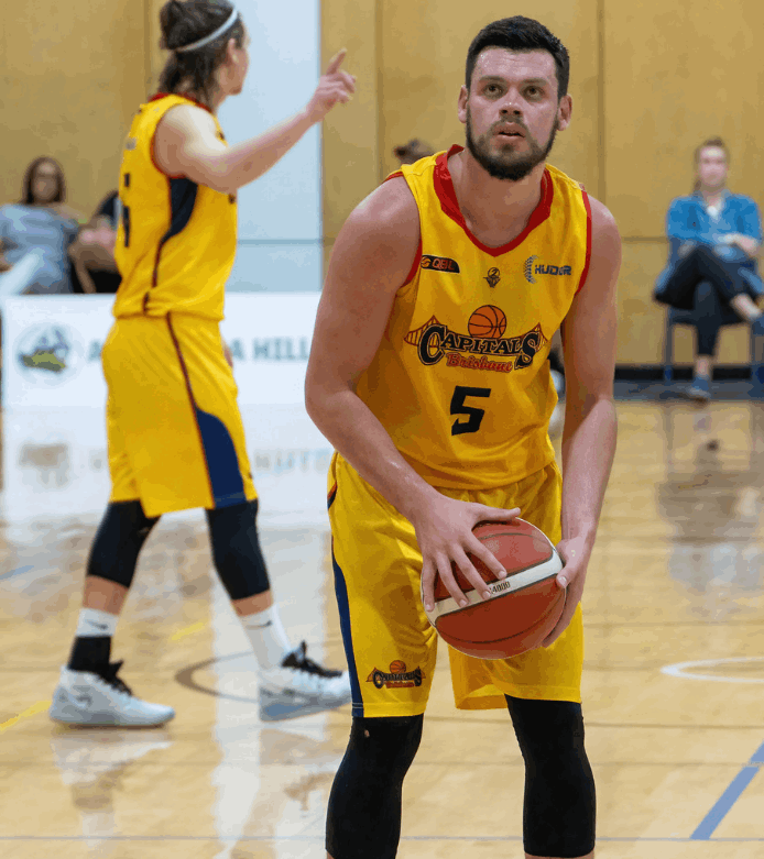 Jason Cadee for Brisbane Capitals at the free throw line about to make a shot.